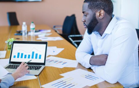 businessman-with-graph-laptop