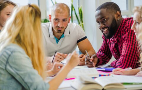 people-table-studying-sharing-ideas