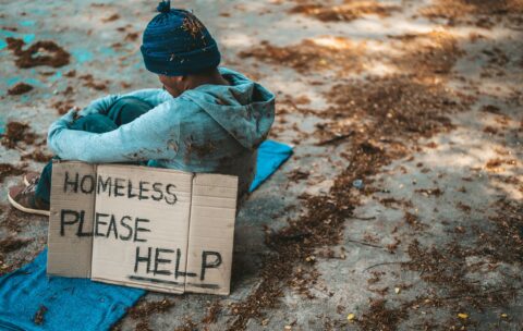 beggars-sitting-street-with-homeless-messages-please-help