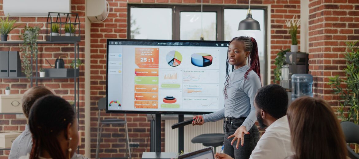 close-up-woman-doing-business-presentation-boardroom-explaining-charts-analysis-workmates-comany-development-growth-employee-presenting-marketing-strategy-screen