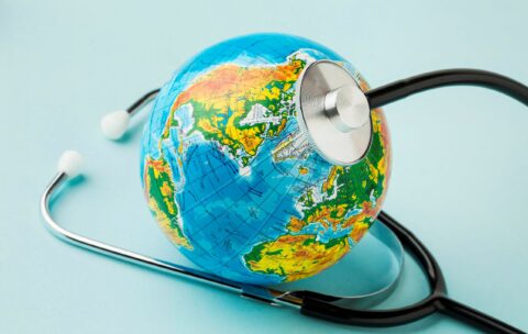 high-angle-globe-with-stethoscope-peace-day