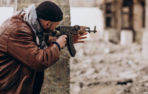 terrorist-with-gun-fighting-with-soldiers