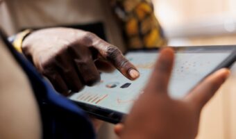 warehouse-worker-hand-pointing-inventory-statistics-tablet (2)