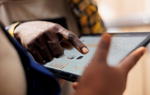 warehouse-worker-hand-pointing-inventory-statistics-tablet (2)